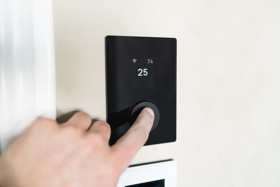 Smart thermostat showing energy efficiency